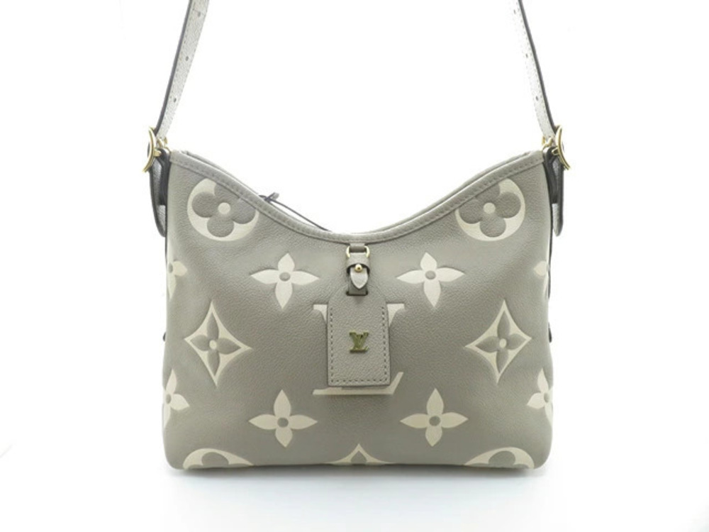 LOUIS VUITTON Carryall Zip NM Bicolor Empreinte Shoulder Bag Tourtrell Cream